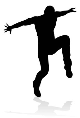 Siluet bir erkek sokak dans hip hop dansçısı