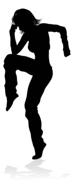 Siluet içinde bir kadın sokak dansı hip hop dansçısı.