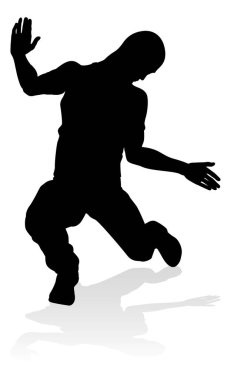 Siluet bir erkek sokak dans hip hop dansçısı