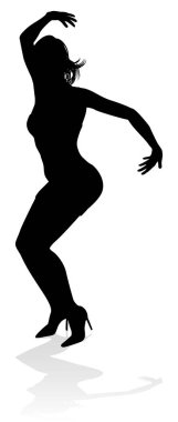 Siluet içinde dans eden bir kadın dansçı.
