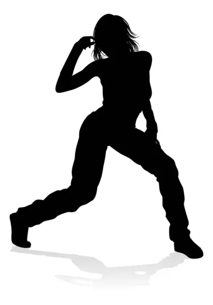 stock vector A woman street dance hip hop dancer in silhouette