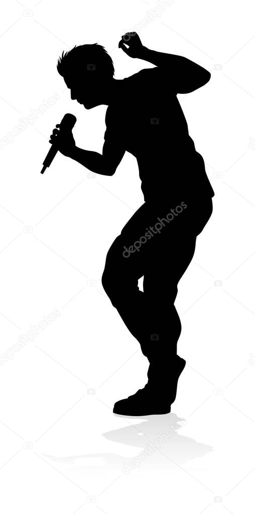 A singer pop, country music, rock star or hiphop rapper artist vocalist singing in silhouette