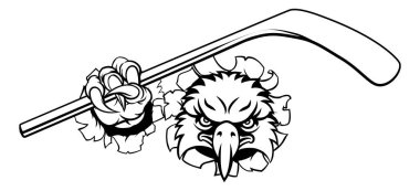 An eagle ice hockey player animal sports mascot holding a hockey stick clipart