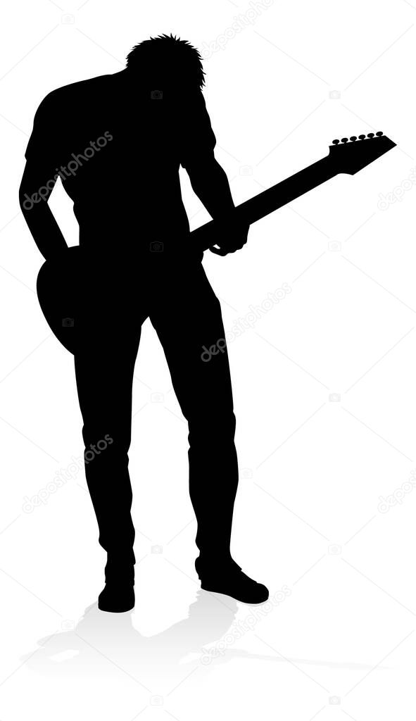 A guitarist musician in detailed silhouette playing his guitar musical instrument.