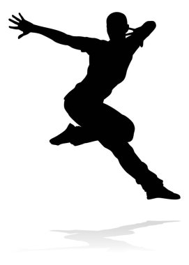 Siluet bir erkek sokak dans hip hop dansçısı
