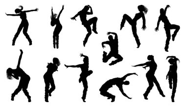 Bir grup kadın ve erkek sokak dansçısı siluet içinde hip hop dansçıları