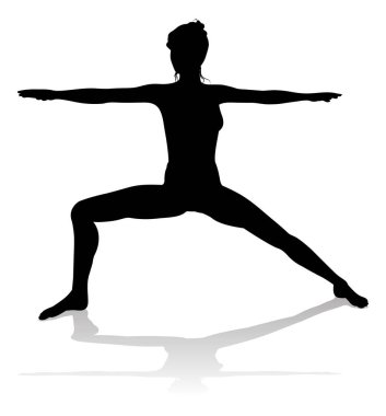 Yoga yapan ya da pilates yapan bir kadının silüeti.