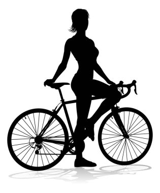 Silüet içinde bisiklet süren bir kadın.
