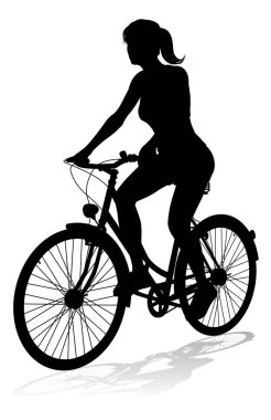 Silüet içinde bisiklet süren bir kadın.