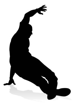 Siluet bir erkek sokak dans hip hop dansçısı