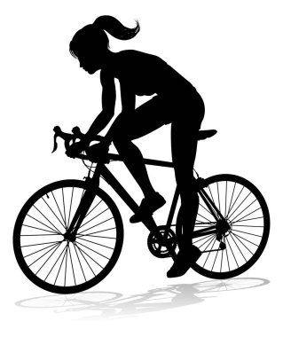 Silüet içinde bisiklet süren bir kadın.