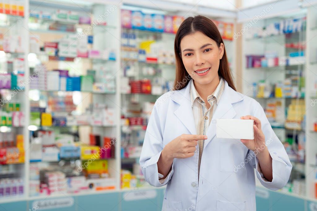 Asian pharmacist woman with protection mask in pharmacy store of her business for sale a drug and pharmacy with her customer