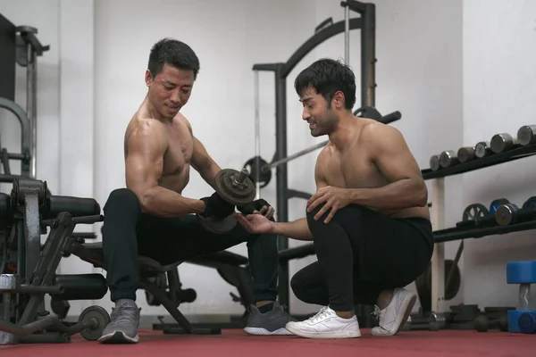 Asian Man Trains Gym Athletic Man Trains Dumbbells Pumping His — Photo