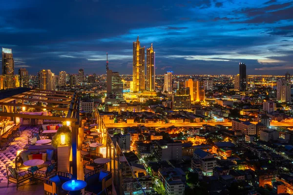 stock image Top view point from roof top bar, highest Building in bangkok city with blue sky in silom district area, Bangkok city, Thailand