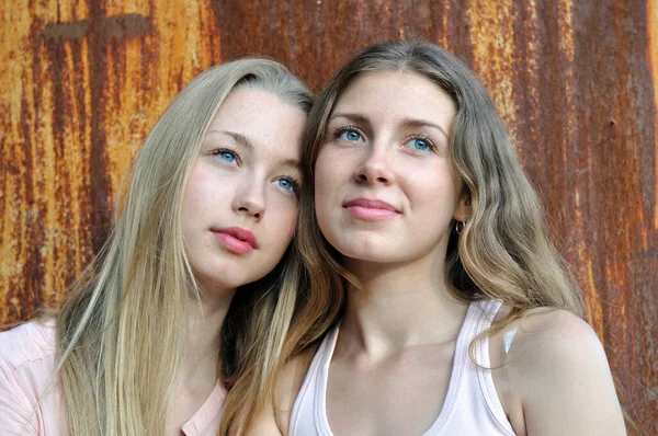 Portrait Two Tired Girls Blue Eyes Rusty Background Summer Day — Stock Photo, Image