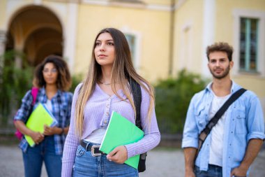 Group of college students in front of their school clipart