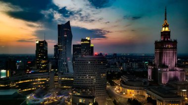 Warsaw, Poland - 08-17-2022. Warsaw city with modern skyscraper at sunset