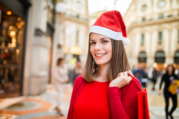 Smiling Young Woman Dressed Red Doing Christmas Shopping — Stock Photo, Image
