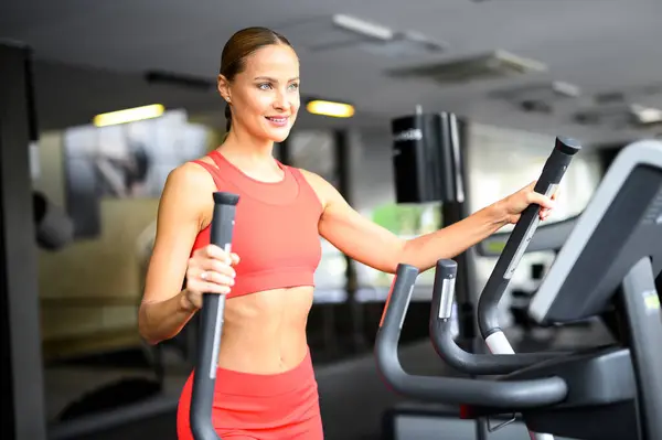 Woman Exercising Gym Elliptical Cross Trainer — Stock Photo, Image