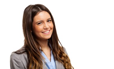 Profesyoneller. Kahverengi saçlı, kendinden emin ve başarılı bir iş kadını. Modern ve zarif bir iş elbisesi giyiyor. Gülümseyen ve etrafa yayılan liderlik ve mutluluk