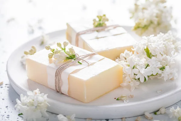 Aromatic lilac soap made of flowers. Flower aromatic soap. Lilac flower soap.