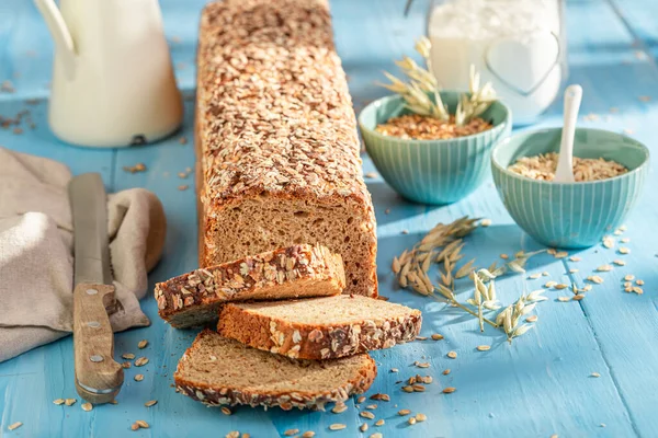 Fit bran bread with grain, ears and bran.. Wholegrain bread with bran.