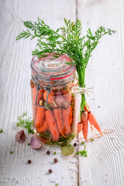 Preparation for pickled carrots with garlic, dill and bay leaf.  Pickling carrots at home.