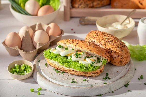 Tasty and homemade sandwich with mayonnaise and eggs. Sandwich for fresh lunch.