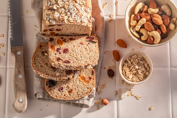 Delicious delicacies bread for perfect and healthy breakfast. Bread with raisins, nuts and bran.