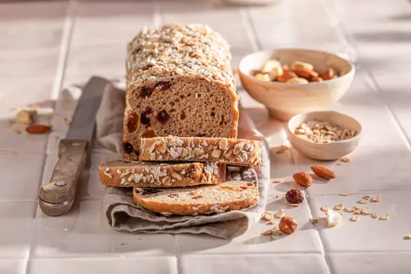 Fit delicacies bread with bran, raisins and nuts. Bread with raisins, nuts and bran.
