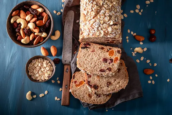 Fit delicacies bread with raisins, nuts and dried fruits. Bread with raisins, nuts and bran.