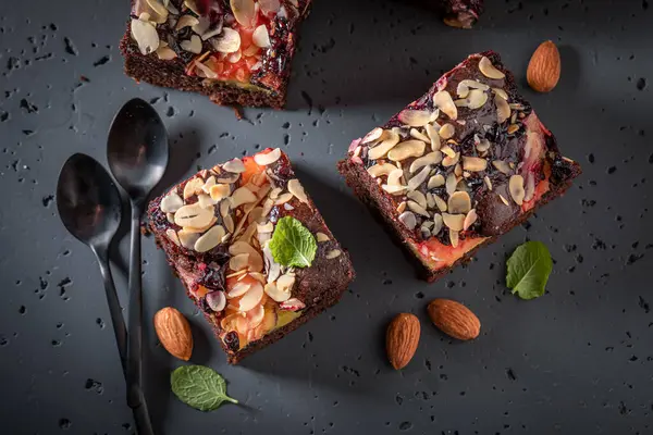 stock image Fresh and delicious brownie as dessert in summer. Cake with fruits.