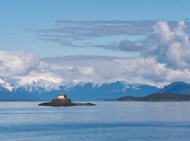 Eldred Rock Lighthous on a beautiful day with clouds in the Lynn Canal in Southeast Alaska. clipart