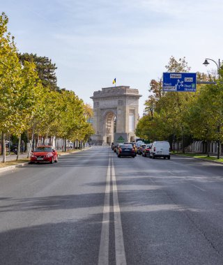 A picture of the Arch of Triumph of Bucharest at the end of the Alexandru Constantinescu Street.