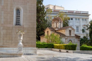 A picture of the Holy Church of Theotokos Gorgoepikoos and Saint Eleutherius, next to the Metropolitan Cathedral of Athens. clipart