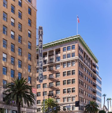A picture of the Taft Building and the building next door.