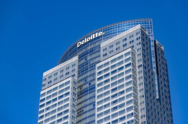 A picture of the top section of the The Gas Company Tower or Deloitte building, in Downtown Los Angeles.