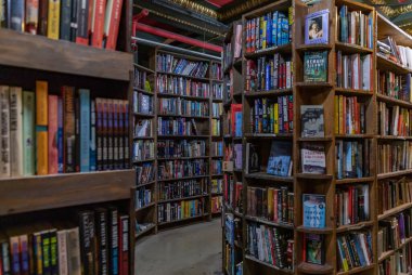 A picture of multiple bookshelves inside The Last Bookstore.