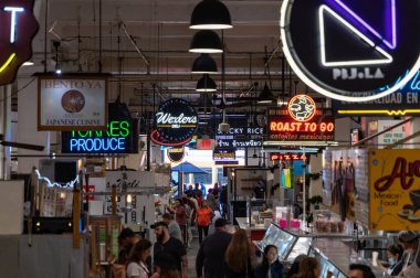 A picture of the neon signs inside the Grand Central Market.