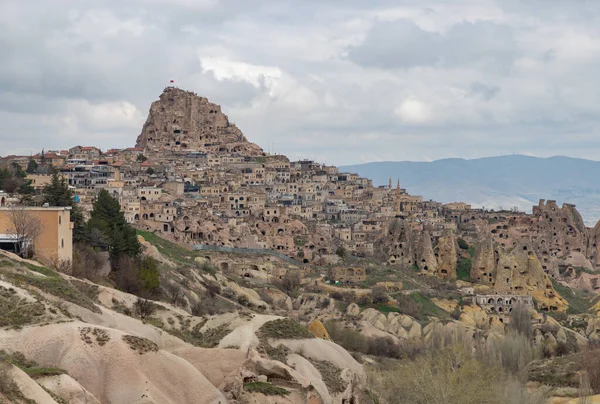 stock image A picture of the Uchisar town in Cappadocia on a cloudy day.