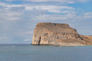 A picture of the Gramvousa Island and Fort on a cloudy day.