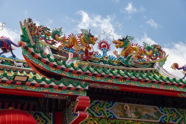A picture of the colorful Kuan Yim Shrine, part of the Thian Fah Foundation, in the Chinatown of Bangkok. clipart