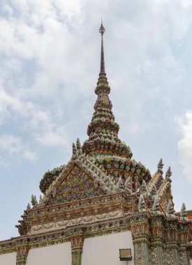 A picture of the Phra Wiharn Yod spire at the Grand Palace. clipart
