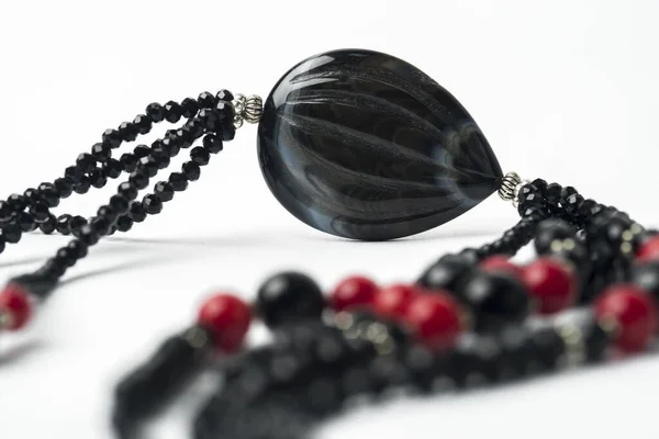 Close Black Beads White Background — Stock Photo, Image