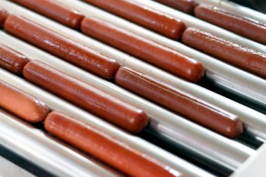 Grilling sausages on a electrical grill. Barbecue