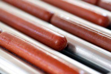 Grilling sausages on a electrical grill. Barbecue
