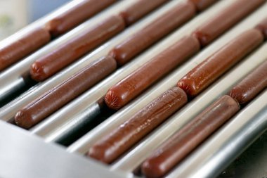 Grilling sausages on a electrical grill. Barbecue