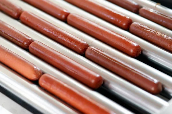 Grilling sausages on a electrical grill. Barbecue