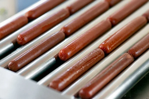 Grilling sausages on a electrical grill. Barbecue