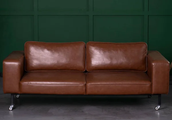 Brown Sofa Dark Leather Green Background Imagem De Stock